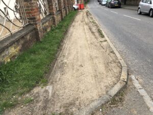The churned up verge by the Marchmont Arms